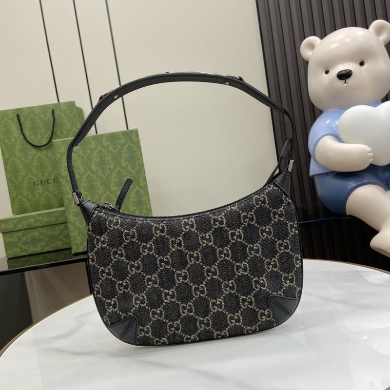 G*u*i top handle bags